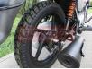 фото заднего колеса мотоцикла Bajaj Boxer 125X