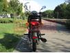 фото красного мотоцикла Bajaj Boxer 125X